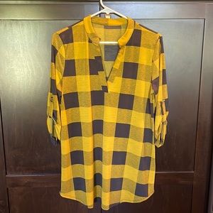Women’s tunic 3/4 sleeve shirt. New without tags, never worn. Size L